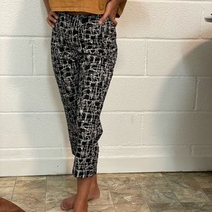 Abstract pattern on black capri pants